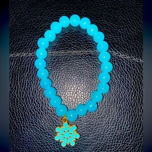 BLUE SNOW FLAKE BEADED BRACELET
